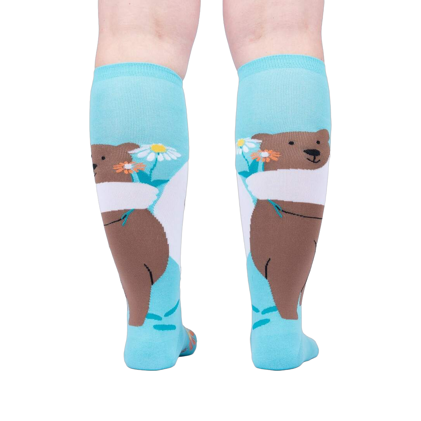 Back view of the socks, highlighting the bear and flower design on the back of the socks.