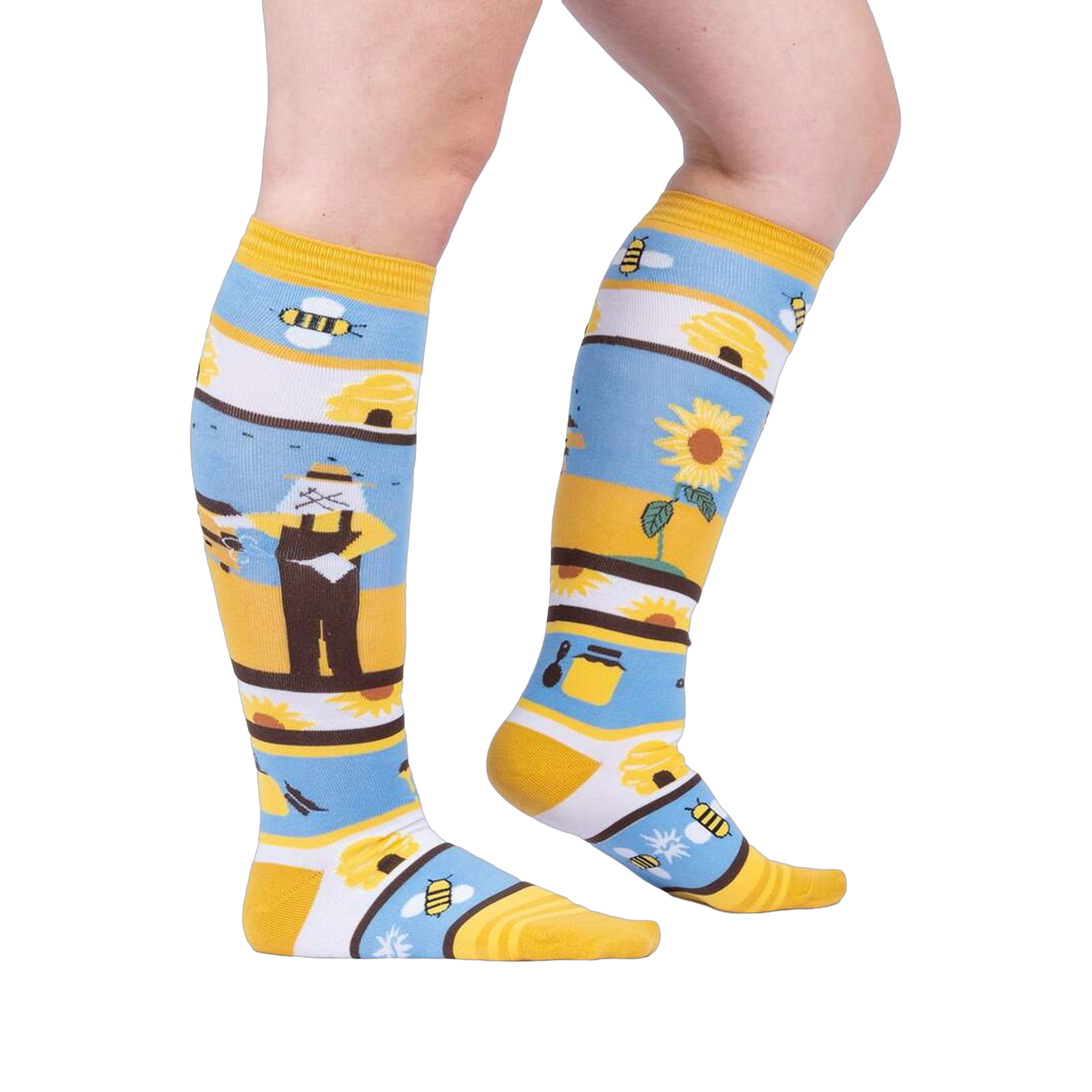 Lifestyle shot: A model's legs wearing the 'Honey, You're a Keeper' knee-high socks.