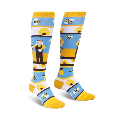 yellow knee-high socks with blue stripes and a bee-themed pattern including bees, sunflowers, a beekeeper, and a beehive for women.  