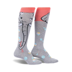 Pair of grey and coral knee-high socks featuring a cute elephant design blowing bubbles. Pastel colored bubbles are scattered across the socks.