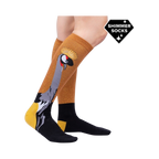 Lifestyle shot showing the Crowned Crane Shimmer socks on a model's legs.