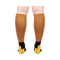 Rear view of the Crowned Crane Shimmer knee-high socks on a model's legs.