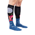 Lifestyle shot: Model wearing Disco Nut! knee-high socks, showcasing the design and fit.