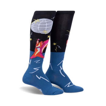 dance like a squirrel with a disco ball helmet in these knee-high women's socks. blue at the bottom, black at the top, with disco stars and lightning bolts.  