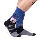 Lifestyle shot: Model wearing the 'Live, Laugh, Lurk' socks, showcasing their fit and design.
