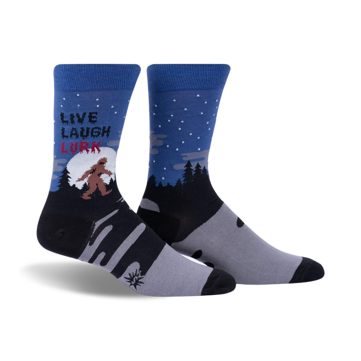 Pair of crew socks in blue, gray, and black, showing a Bigfoot design in a snowy forest scene with the text 'Live, Laugh, Lurk'.