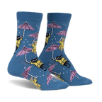 Pair of blue crew socks with a repeating pattern of black cats and dogs in yellow raincoats holding pink umbrellas in the rain.