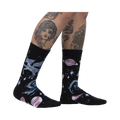 Lifestyle shot of Ancient Pegasus socks on a model's legs, showcasing the sock design and fit.