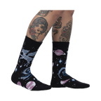 Lifestyle shot of Ancient Pegasus socks on a model's legs, showcasing the sock design and fit.