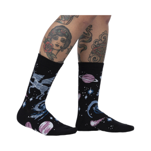 Lifestyle shot of Ancient Pegasus socks on a model's legs, showcasing the sock design and fit.