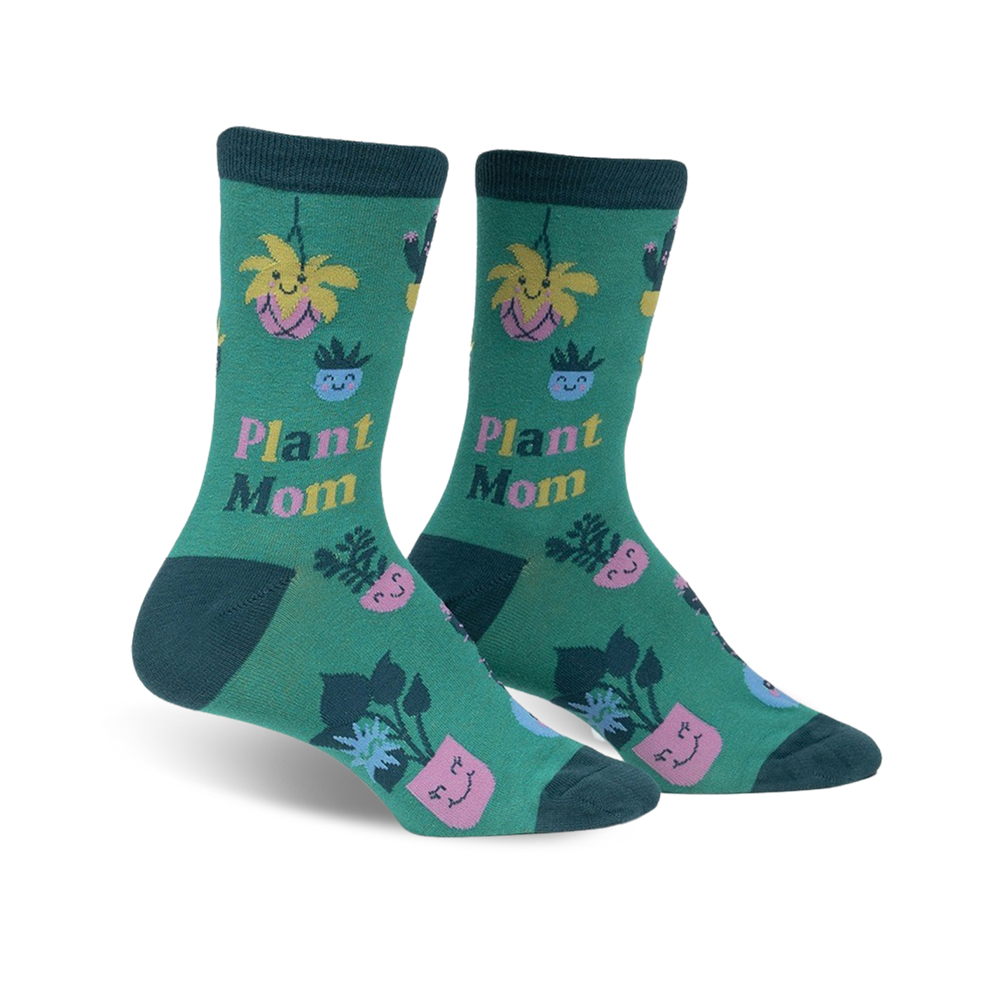 Pair of women's crew socks. Green background with illustrations of potted plants, cacti, and flowers with happy faces. Text reads 'Plant Mom'.