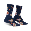 Pair of navy blue crew socks featuring sloths celebrating a party with colorful party hats, presents, and wine glasses.