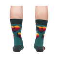 Rear view of the teal socks, showcasing the back and heel; the design is visible on the back of the socks.