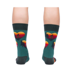 Rear view of the teal socks, showcasing the back and heel; the design is visible on the back of the socks.