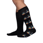Pedal Power socks shown on a model's legs, showcasing the fit and design on the lower leg.