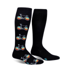 Pair of black knee-high socks with repeating patterns of retro-colored bicycles. 