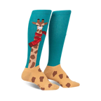 Pair of teal and tan knee-high socks featuring a whimsical giraffe design wearing a red scarf.