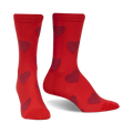 Pair of crew socks; red with maroon fuzzy hearts, shown from the side and slightly angled. 