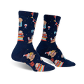 Pair of navy blue crew socks featuring sloths celebrating with books, wine, and party hats.  Red, orange, and yellow design elements.
