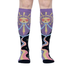 Front view of model wearing a pair of Cosmic Connection knee-high socks.