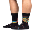 Lifestyle shot of Bike-Squatch socks on a person's legs. Shows the socks' fit and design in action.