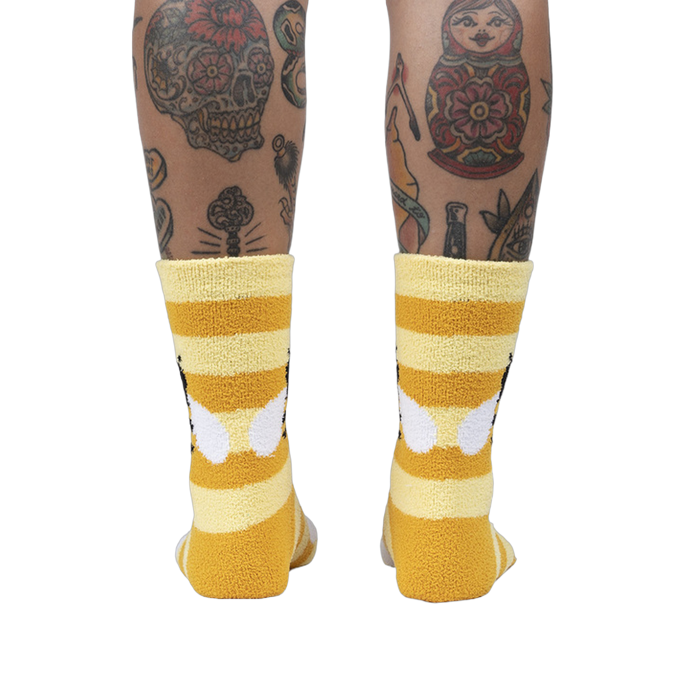 Back view of the Bee Cozy Slipper Socks on a person's legs.