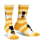 Pair of yellow and white striped slipper socks with embroidered bumblebees.  Fuzzy, cozy texture.