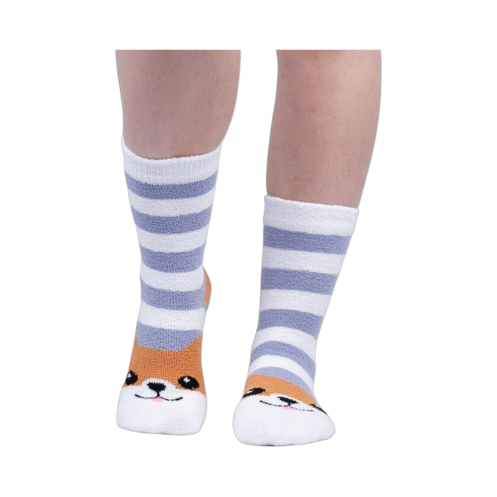 Lifestyle shot of a person wearing the Hey Corgeous Slipper Socks, showing the socks on their feet.