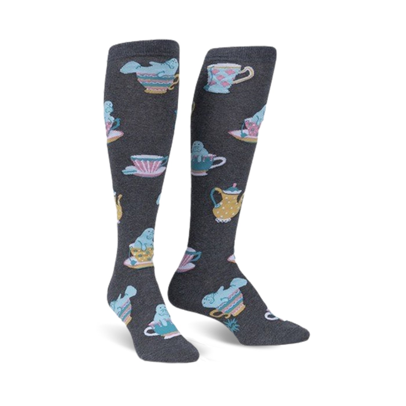 Pair of knee-high socks in dark gray featuring a pattern of manatees relaxing in pastel teacups and teapots.
