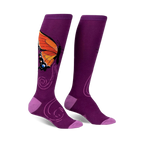 Pair of purple knee-high socks with an orange butterfly design and swirling patterns.  Features a lilac-colored cuff.