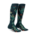 Pair of women's knee-high socks. Deep teal background with embroidered gold and red cacti and succulents.