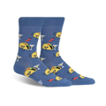 A pair of crew socks in blue featuring fun illustrations of tacos with sunglasses, margaritas, and chili peppers.