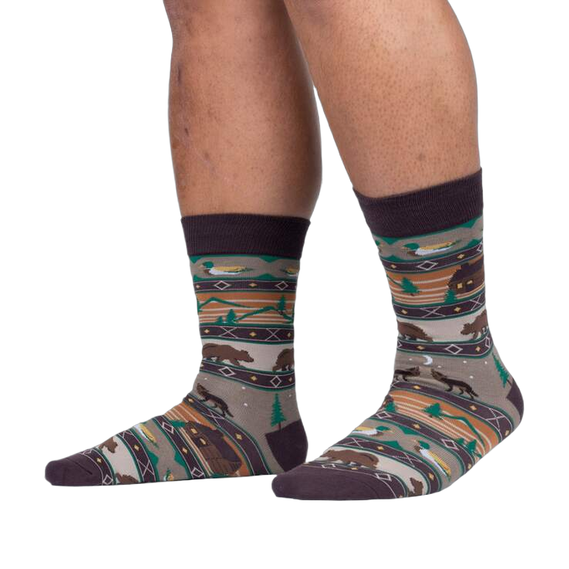 Lifestyle shot of a person's legs wearing Cabin Life socks, showcasing the full sock design on the feet.