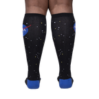 Rear view of the socks on a person's legs, showcasing the back design and overall look.