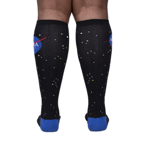Rear view of the socks on a person's legs, showcasing the back design and overall look.