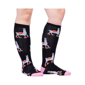 Lifestyle shot showing the socks on a person's legs, showcasing how they look when worn.