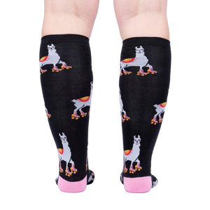 Rear view of the socks on a person's legs, highlighting the full pattern.