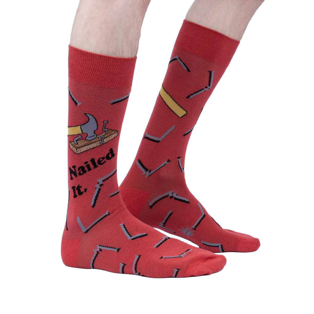 Lifestyle photo: Person wearing the 'Nailed It' socks, showcasing fit and style.