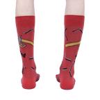 Rear view of the 'Nailed It' socks on a person, emphasizing the full design.