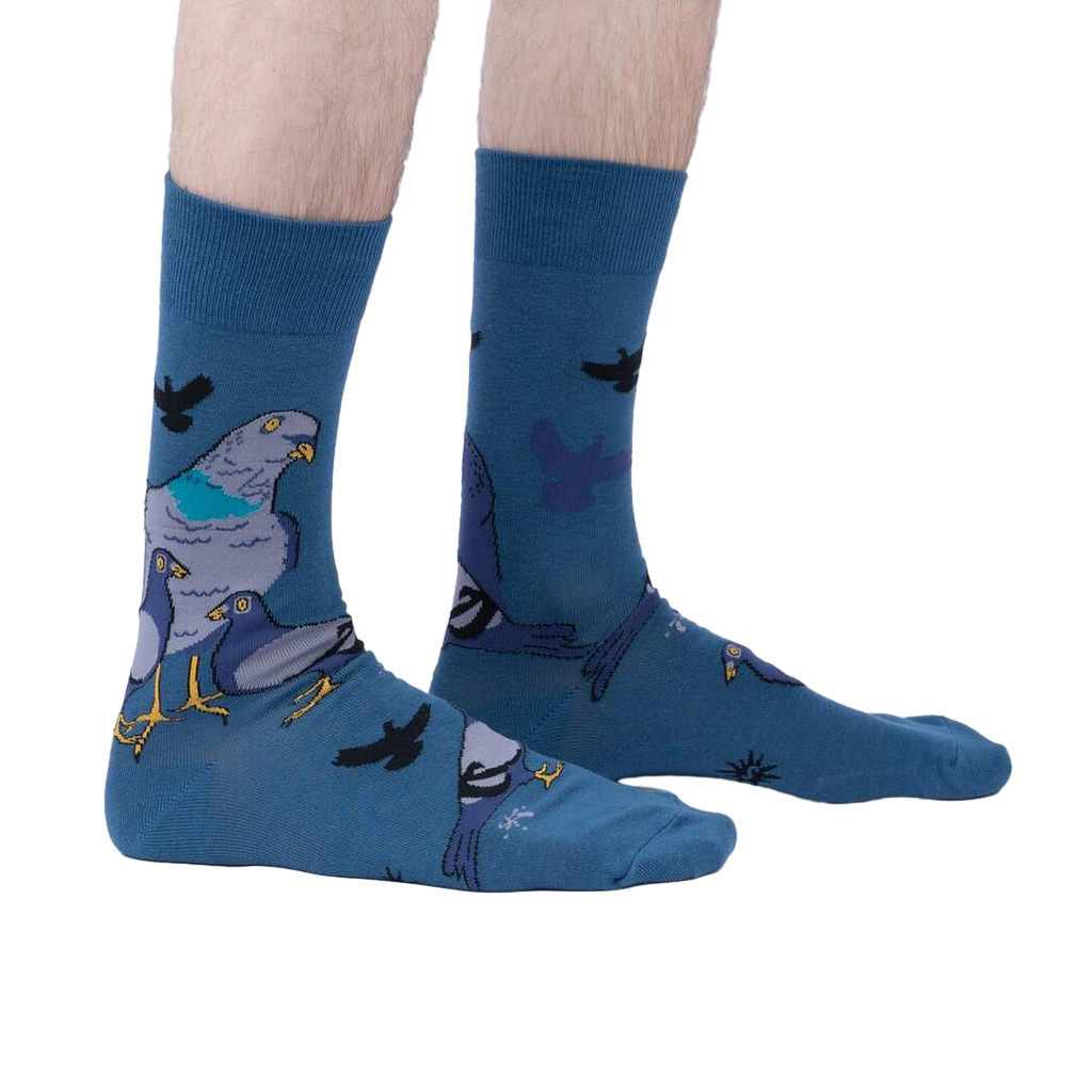 Lifestyle shot of a person wearing the So Fly So Coo socks, showcasing the fit and style on the foot and leg.