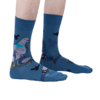 Lifestyle shot of a person wearing the So Fly So Coo socks, showcasing the fit and style on the foot and leg.