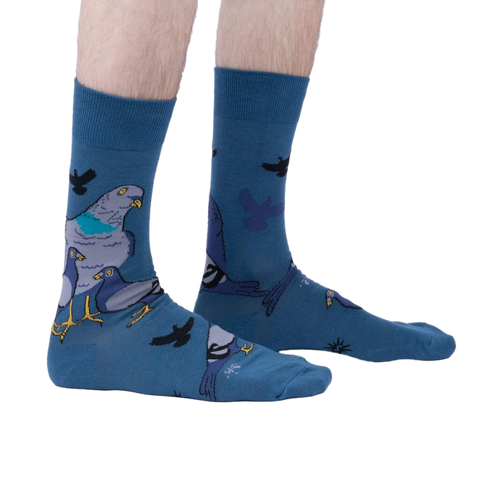 Lifestyle shot of a person wearing the So Fly So Coo socks, showcasing the fit and style on the foot and leg.