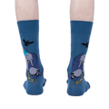 Rear view of the So Fly So Coo socks on a person's legs, highlighting the design on the back of the socks.