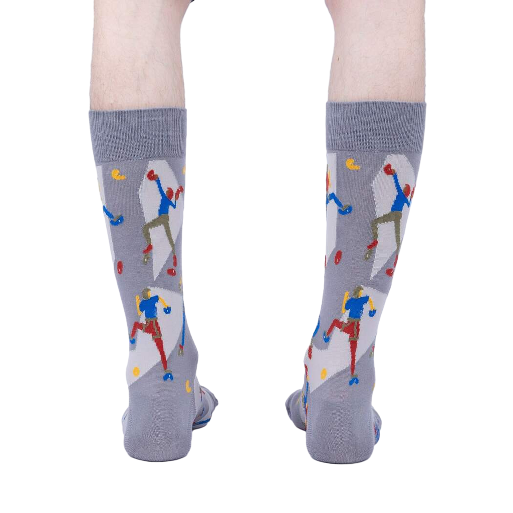 Rear view of a pair of gray Sock Climbing socks on a person's legs, highlighting the sock's full design.