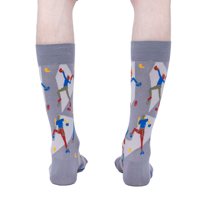 Rear view of a pair of gray Sock Climbing socks on a person's legs, highlighting the sock's full design.