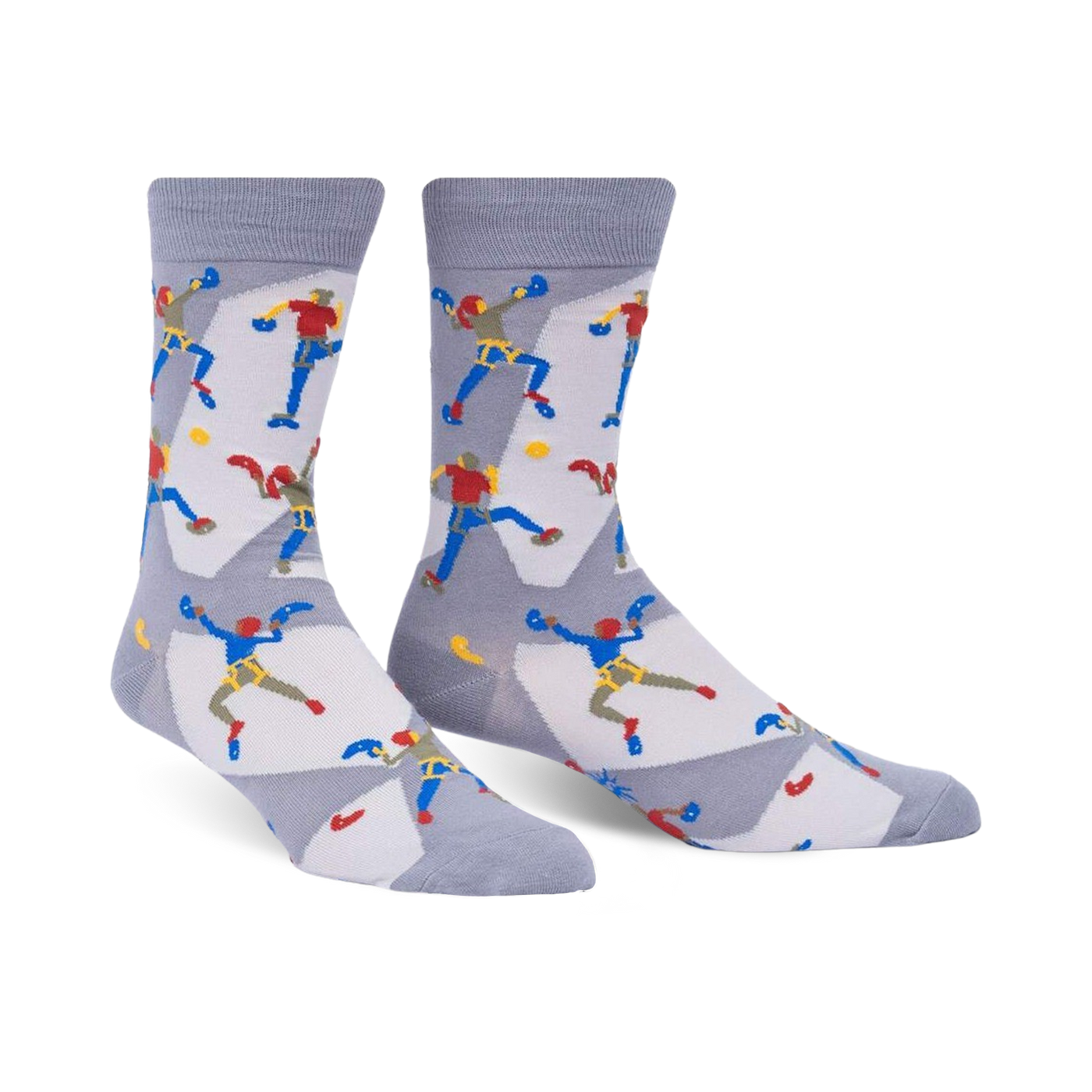 A pair of gray crew socks with a repeating pattern of illustrated rock climbers in red, blue, and yellow. 