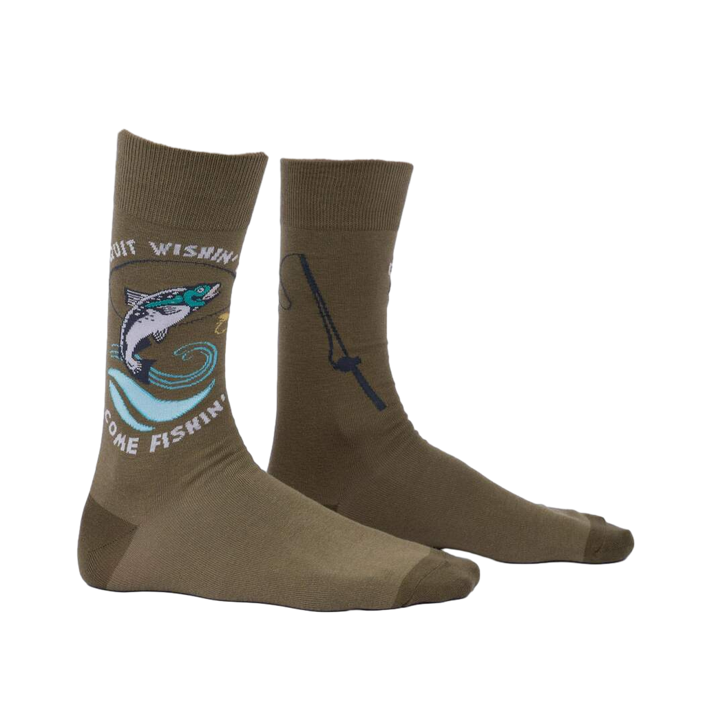 Lifestyle shot of a person's legs wearing the olive green 'Quit Wishin' & Come Fishin' socks.