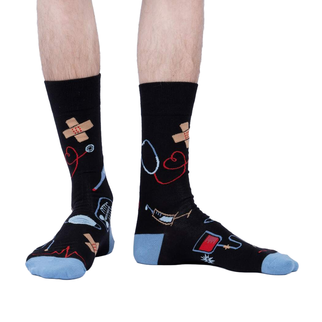 Lifestyle shot: A person modeling the Thoracic Park socks, showing how they look when worn.