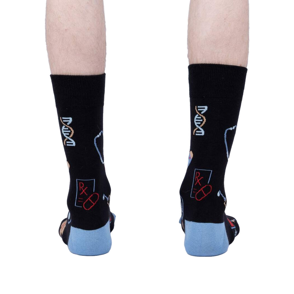 Back view of the Thoracic Park socks on a model's legs, highlighting the design details on the back of the socks.