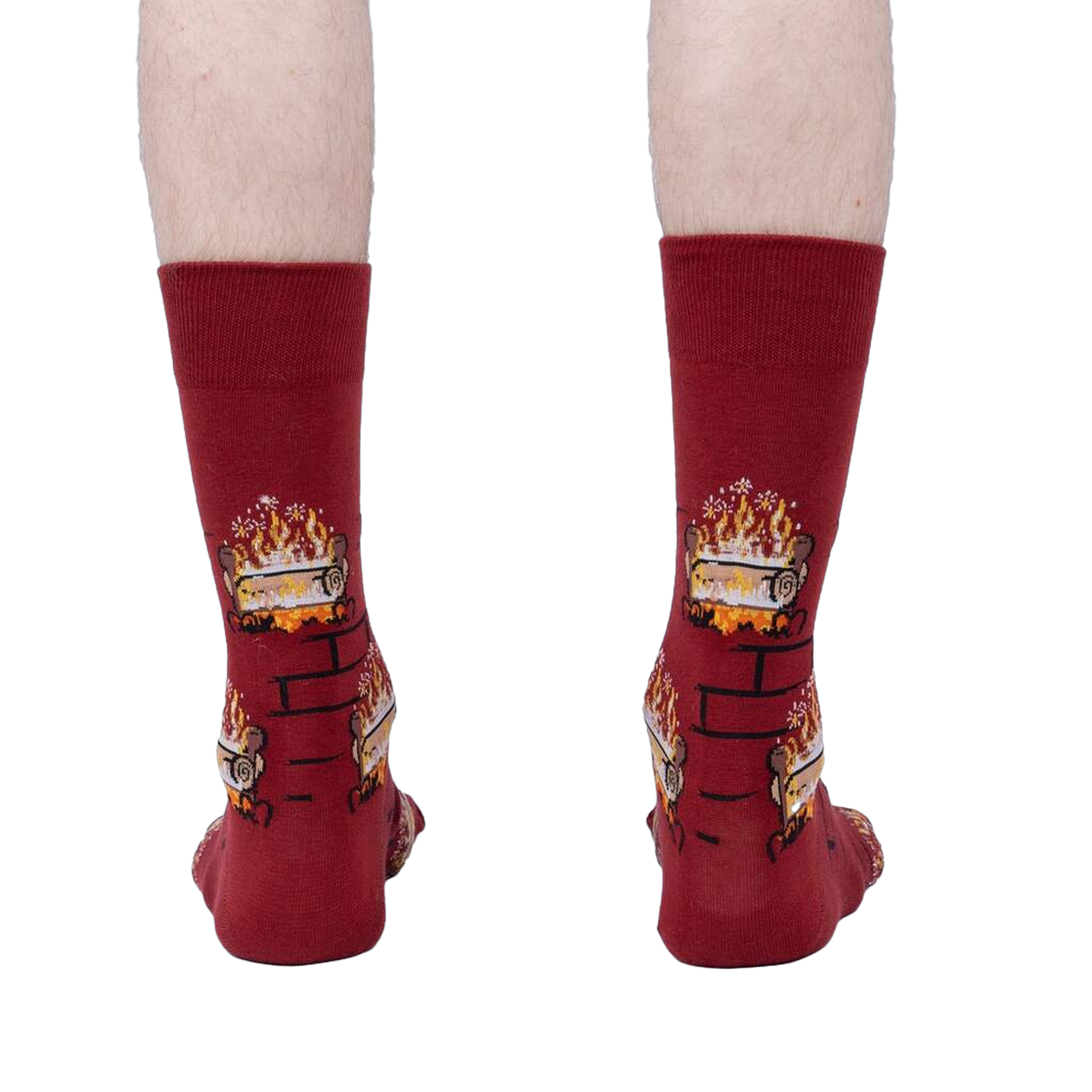 Rear view of a person wearing the Yule Log socks, showcasing the full design on the back of the socks.